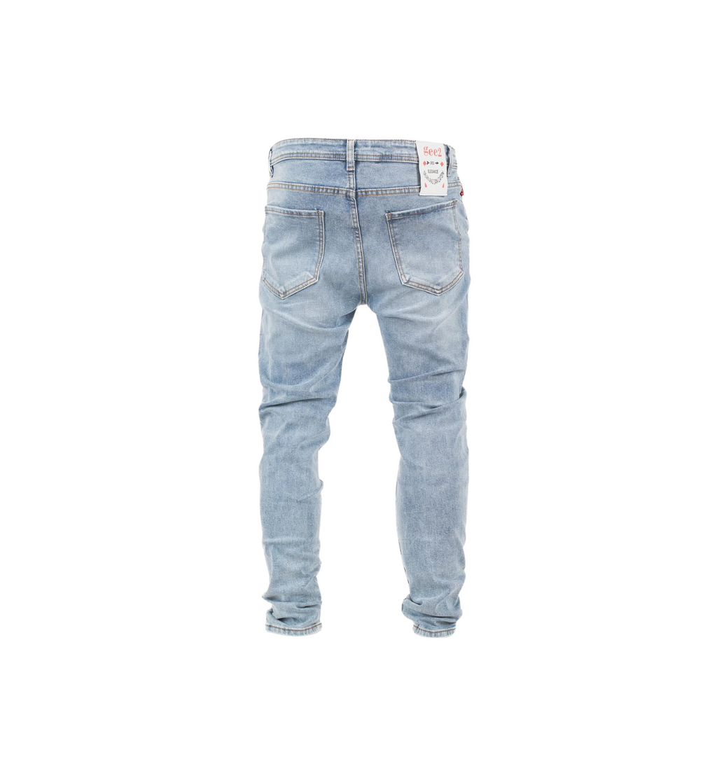 Distressed “79” Slim Fit Denim Jeans